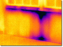 2012_IR_2362: Water infiltrates around a faulty window, running down the inside of the wall to the floor.