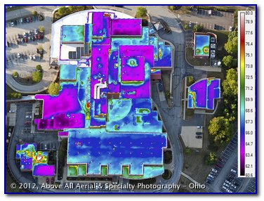 An infrared image of multiple roofs having many different elevations overlaid on top of a visible image of the building complex.