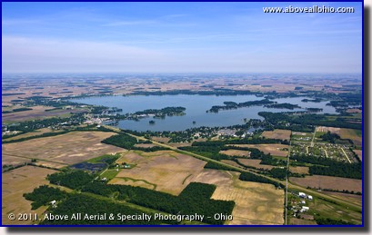 A wide angle aerial photograph of blue skies and thin clouds over Indian Lake State Park, Russells Point, Ohio